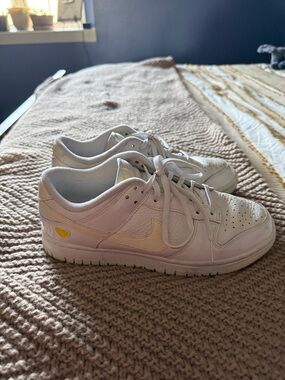 Nike White Low-Top Sneakers with Yellow Heart Accent